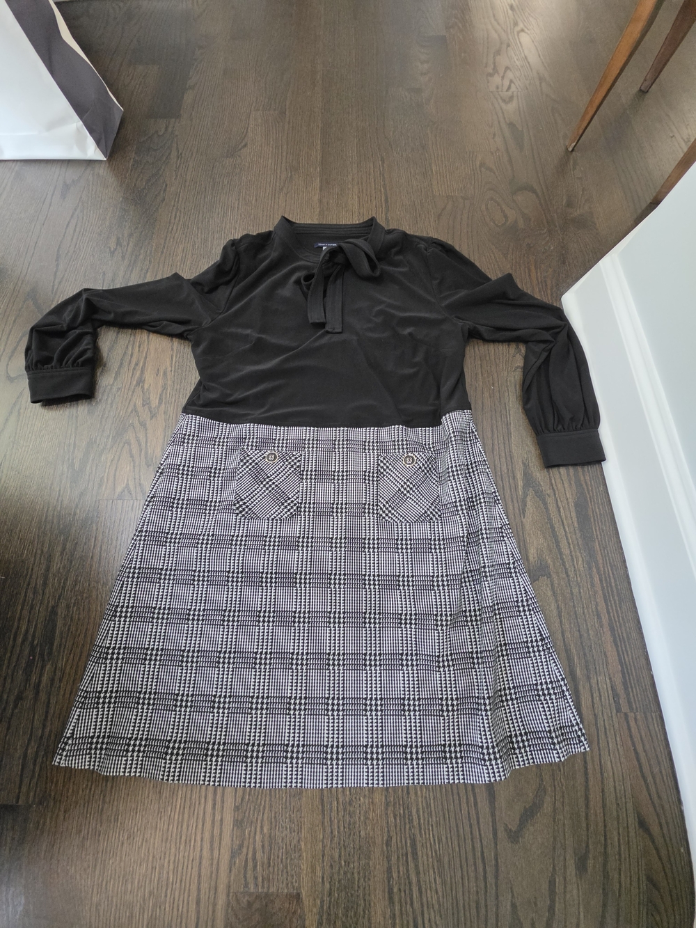 Tommy Hilfiger Black Top with Black-and-White Plaid A-Line Skirt